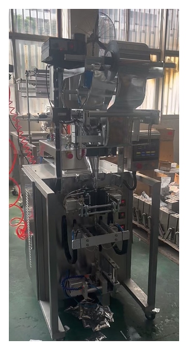 Фасовочно-упаковочная машина Hualian DXDG-80S  (4-х шовный пакет, 5-30 мл)