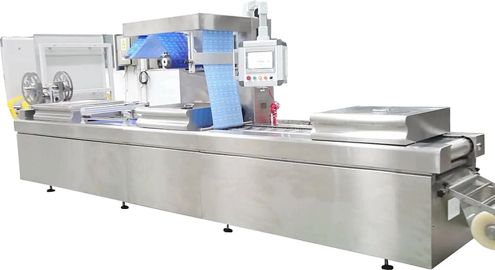 Машина термоформовочная автоматическая Hualian HVR-420A с этикеровщиком